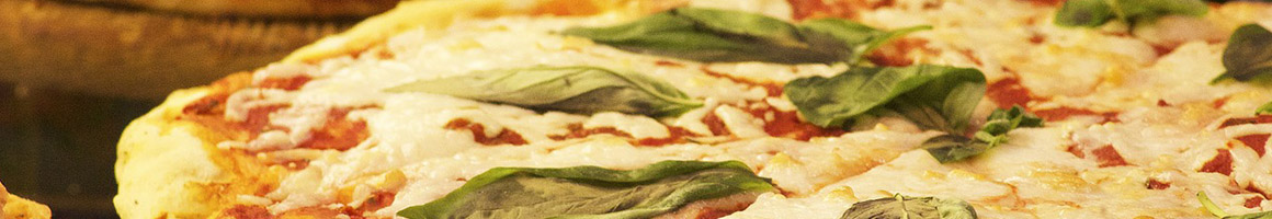 Eating Pizza at Carmellas Pizza Grill restaurant in Fort Mill, SC.